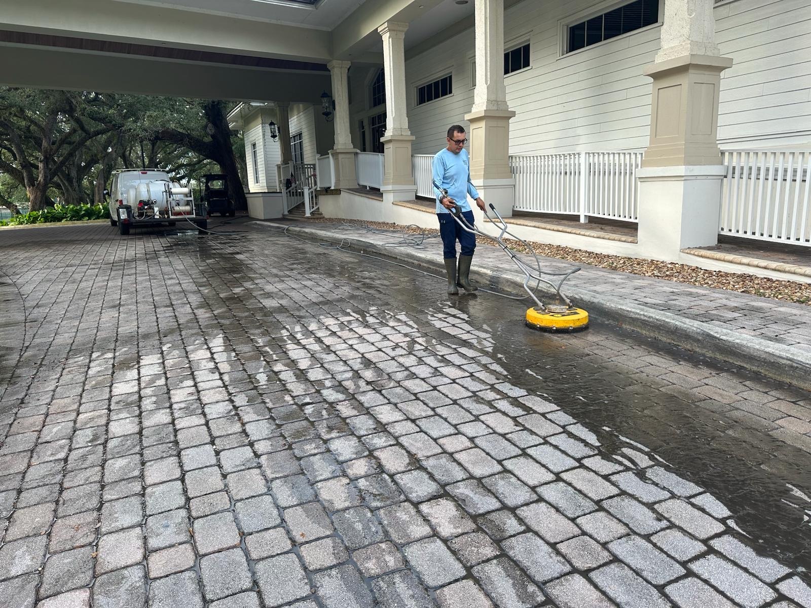 Surface cleaning at a large covered property entrance